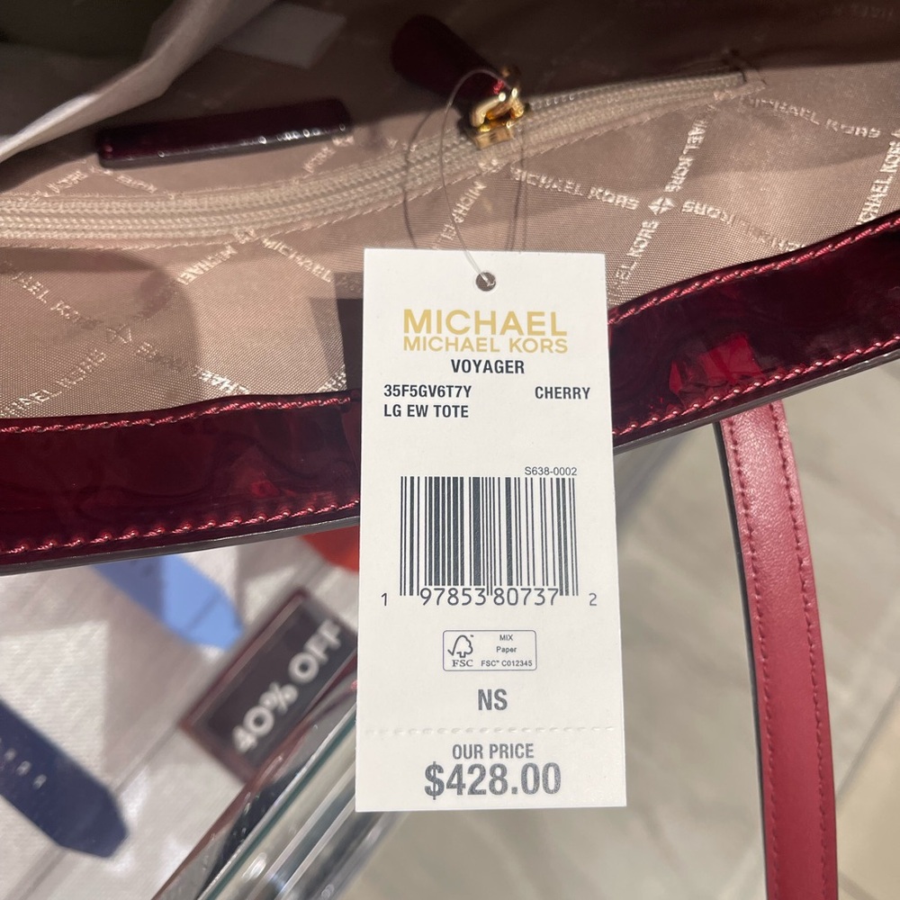 MICHAEL KORS Voyager Lg Metallic Logo Debossed EW Shoulder Tote Bag
Cherry
NWT - Picture 9 of 16